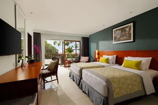A deluxe room set up with twin bedding