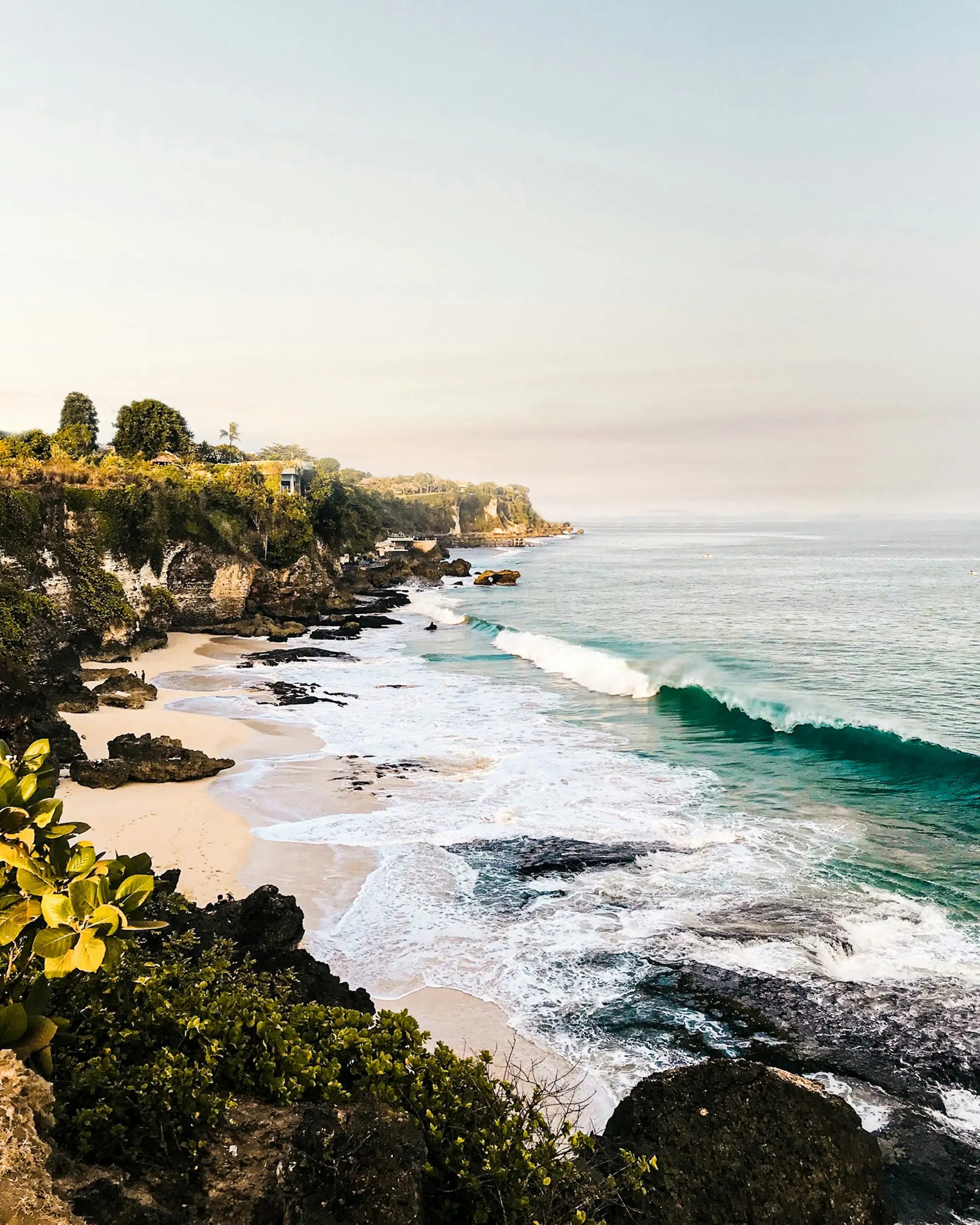 A still ocean view with soft light on the water